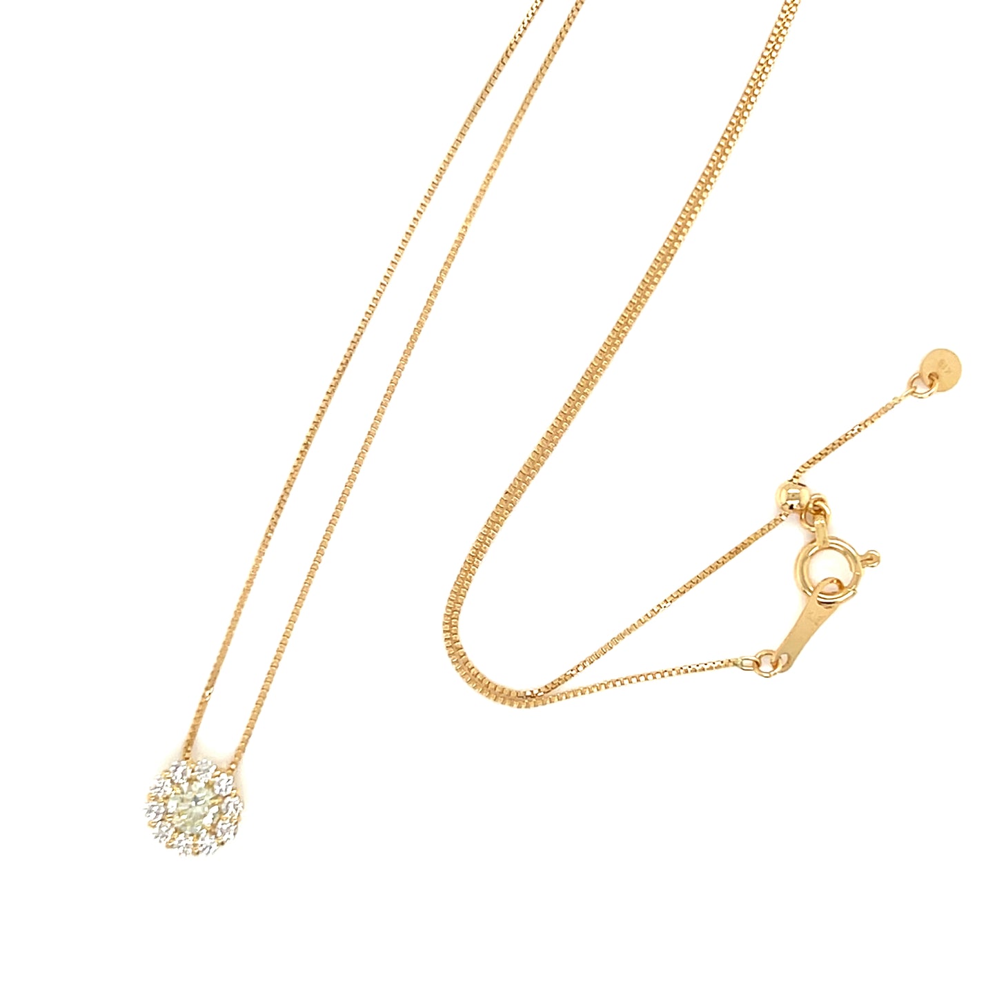 Gold necklace with a delicate pendant on a white background