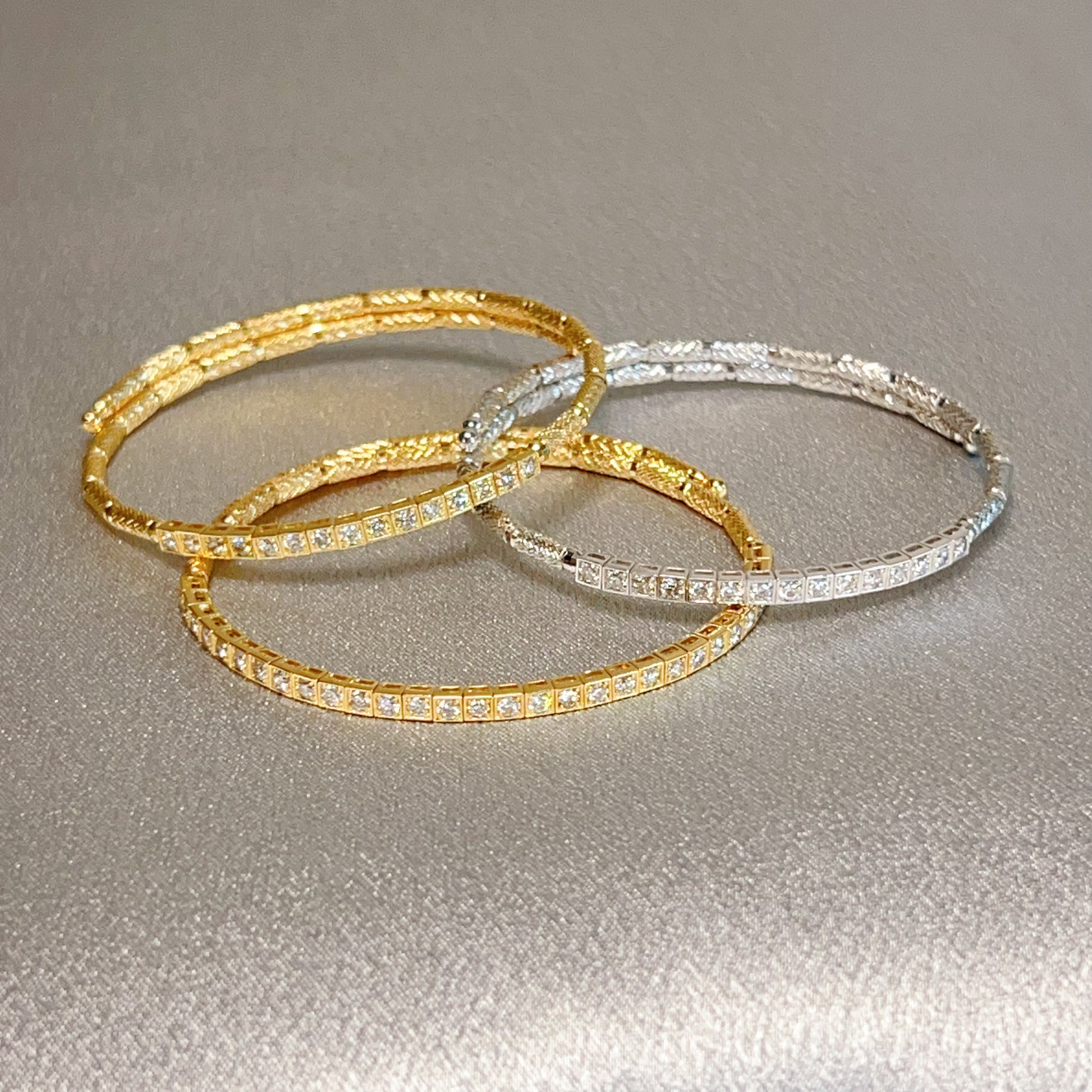 #flexi_bangles# - #jmw_jewelry_wholesale# - #Three flexible 18K gold bangles encrusted with sparkling natural diamonds#