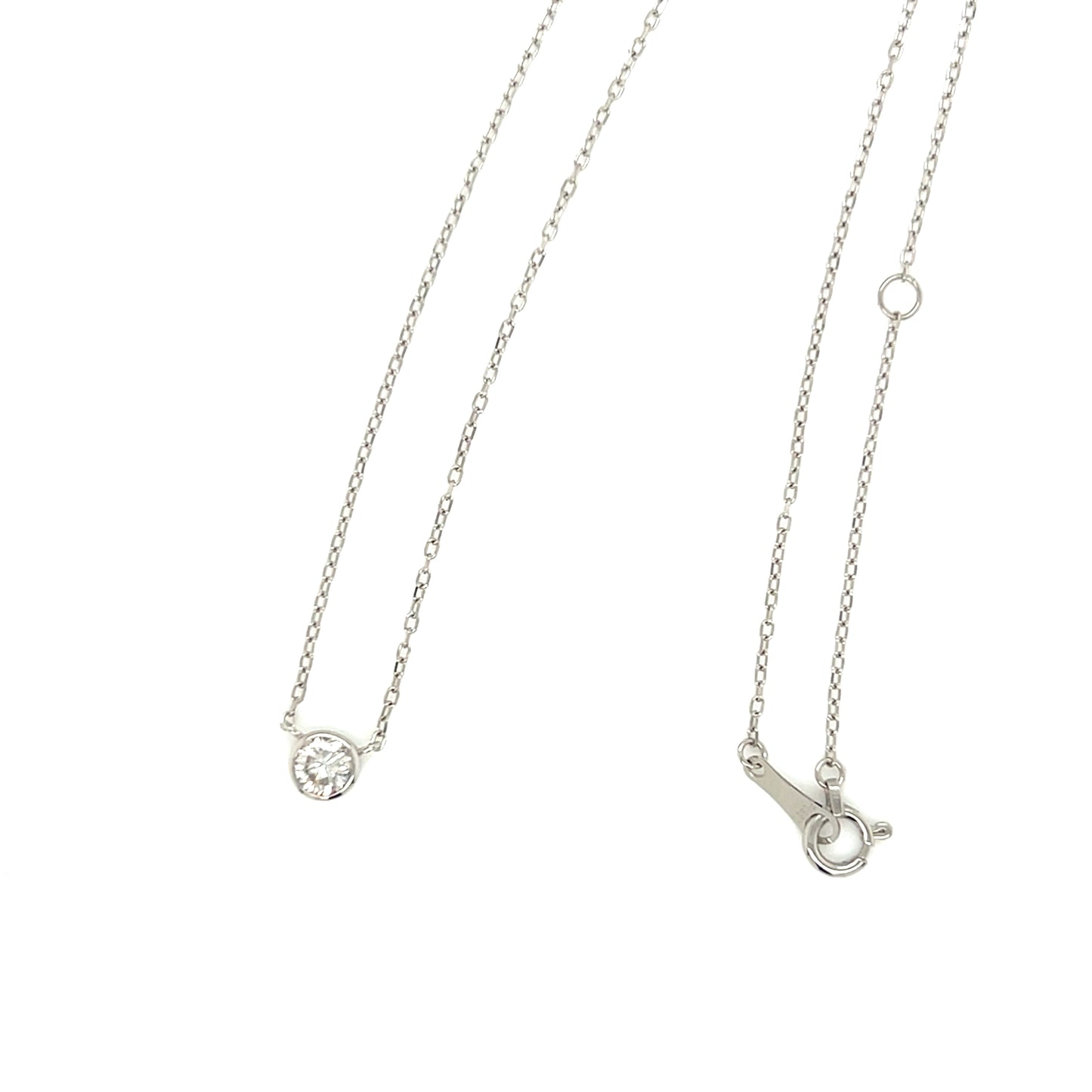 Platinum necklace with a round diamond pendant on a white background