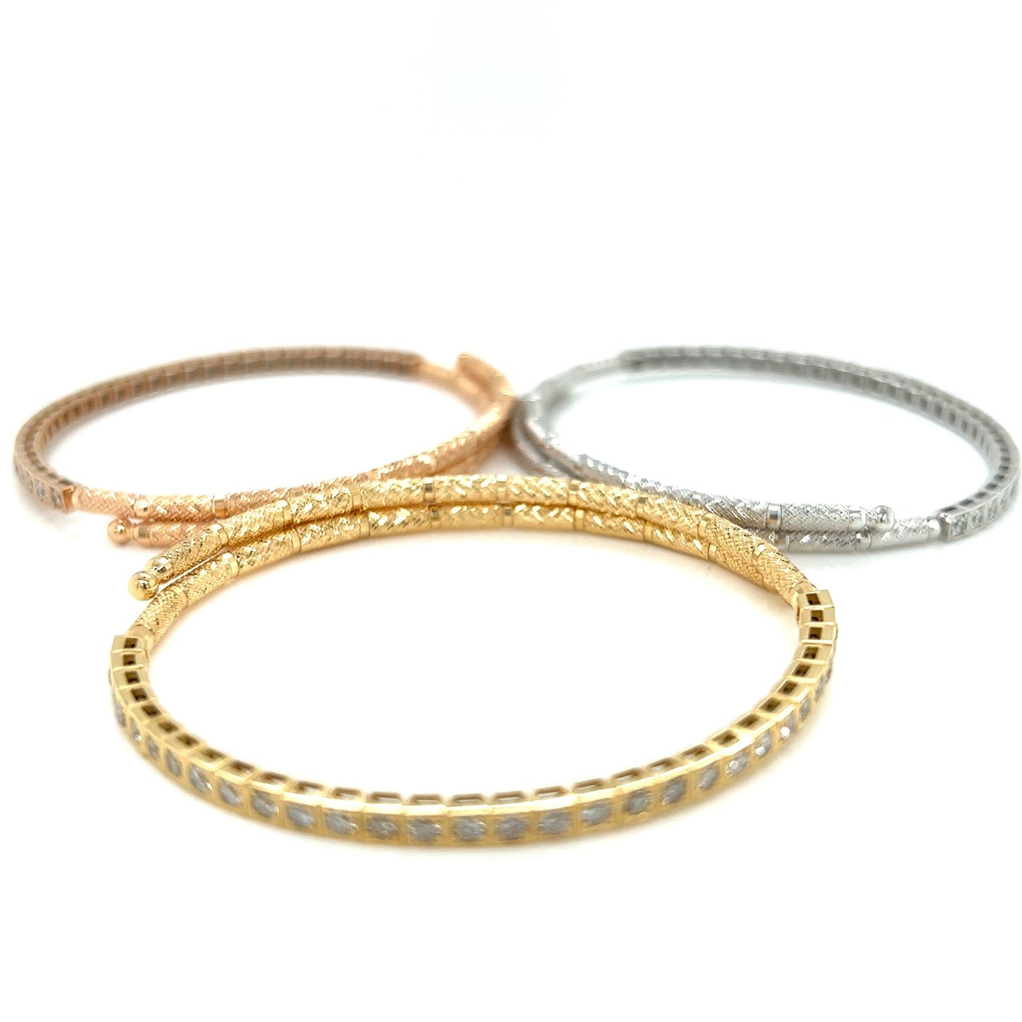 #flexi_bangles# - #jmw_jewelry_wholesale# - #Three flexible bangles in 18K White, Yellow and Pink gold with natural diamonds#