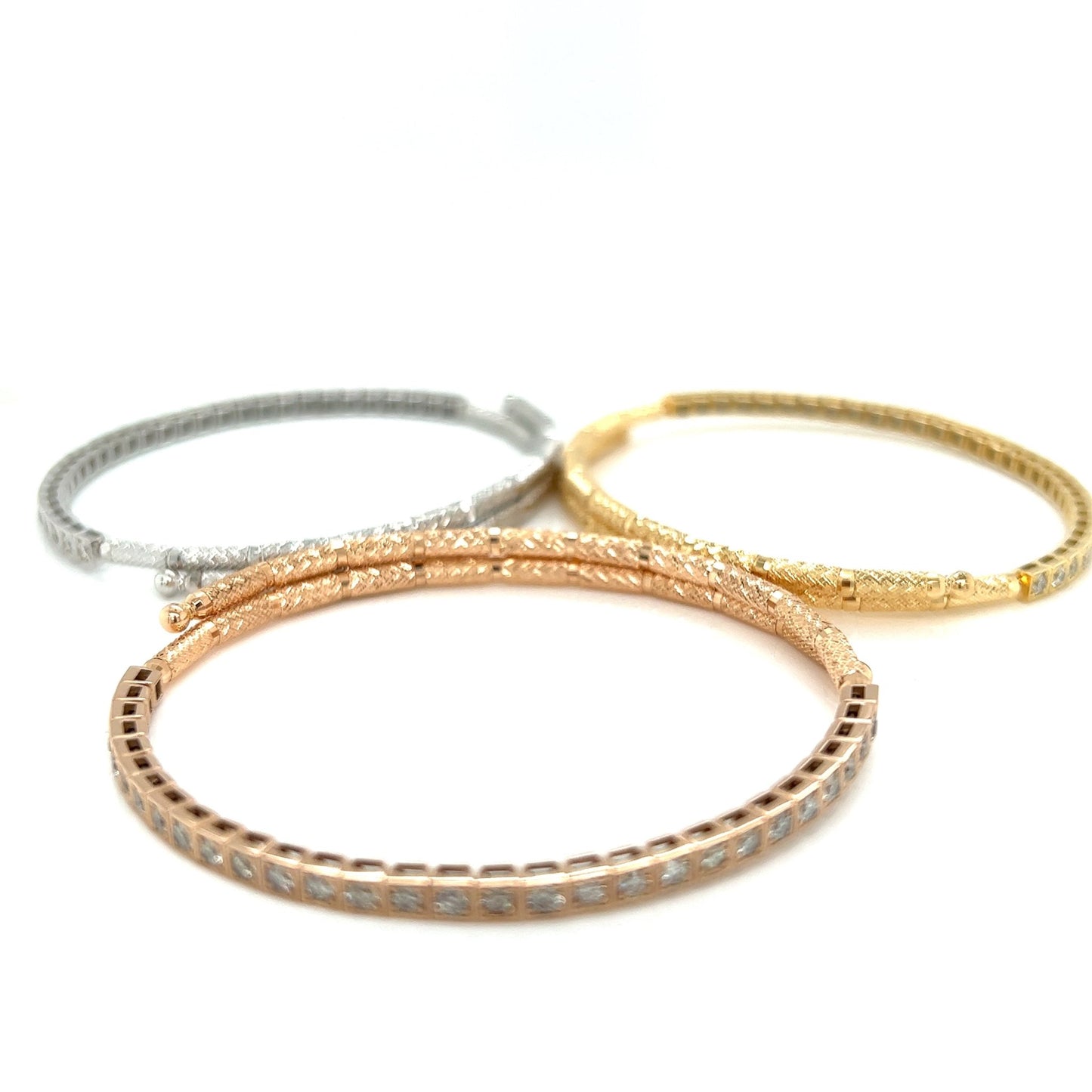 #flexi_bangles# - #jmw_jewelry_wholesale# - #Three flexible bangles in 18K White, Yellow and Pink gold with natural diamonds#