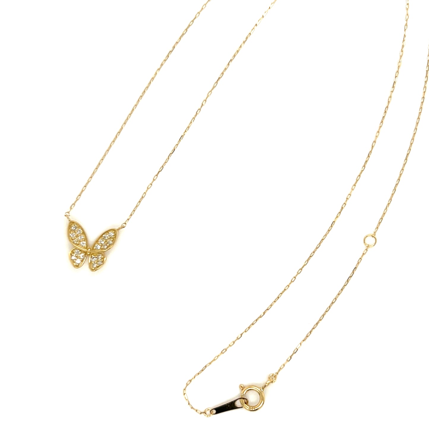 Gold butterfly necklace on a white background