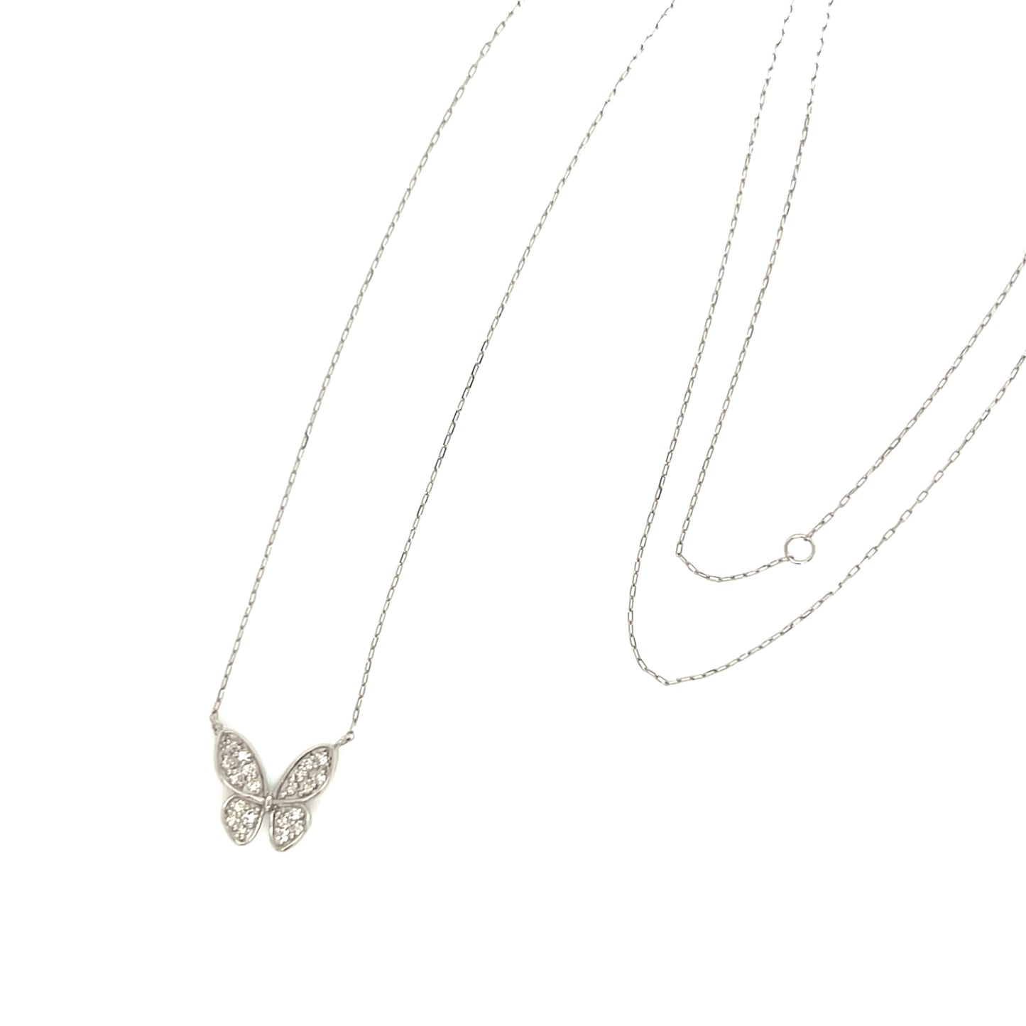 Butterfly necklace with clear stones on a thin chain against a white background