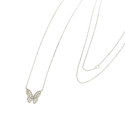 Butterfly necklace with clear stones on a thin chain against a white background