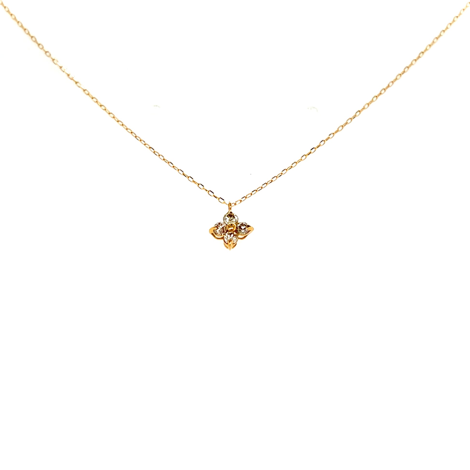 18k Gold necklace with a flower pendant on a white background