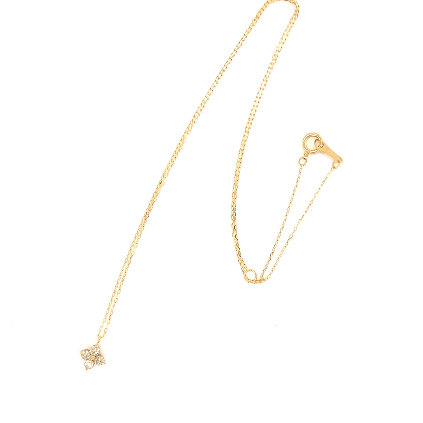 18k Gold necklace with a small flower-shaped pendant on a white background