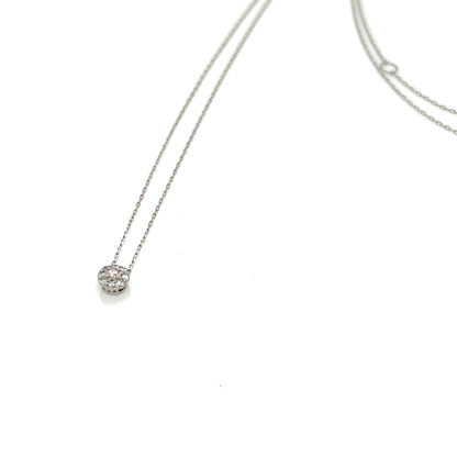 Platinum necklace with a small round Diamond pendant on a white background