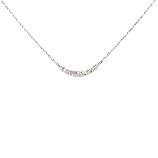 Delicate smile 18k gold necklace on a white background