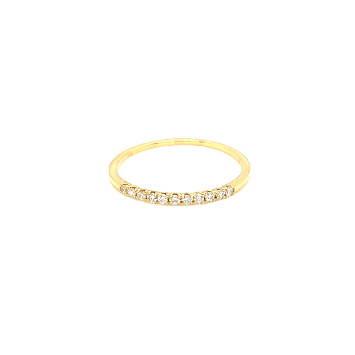 Gold ring with blue eye design on a white background