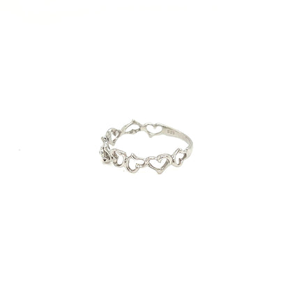 A delicate silver ring featuring a continuous chain of small open heart links, photographed on a solid white background.