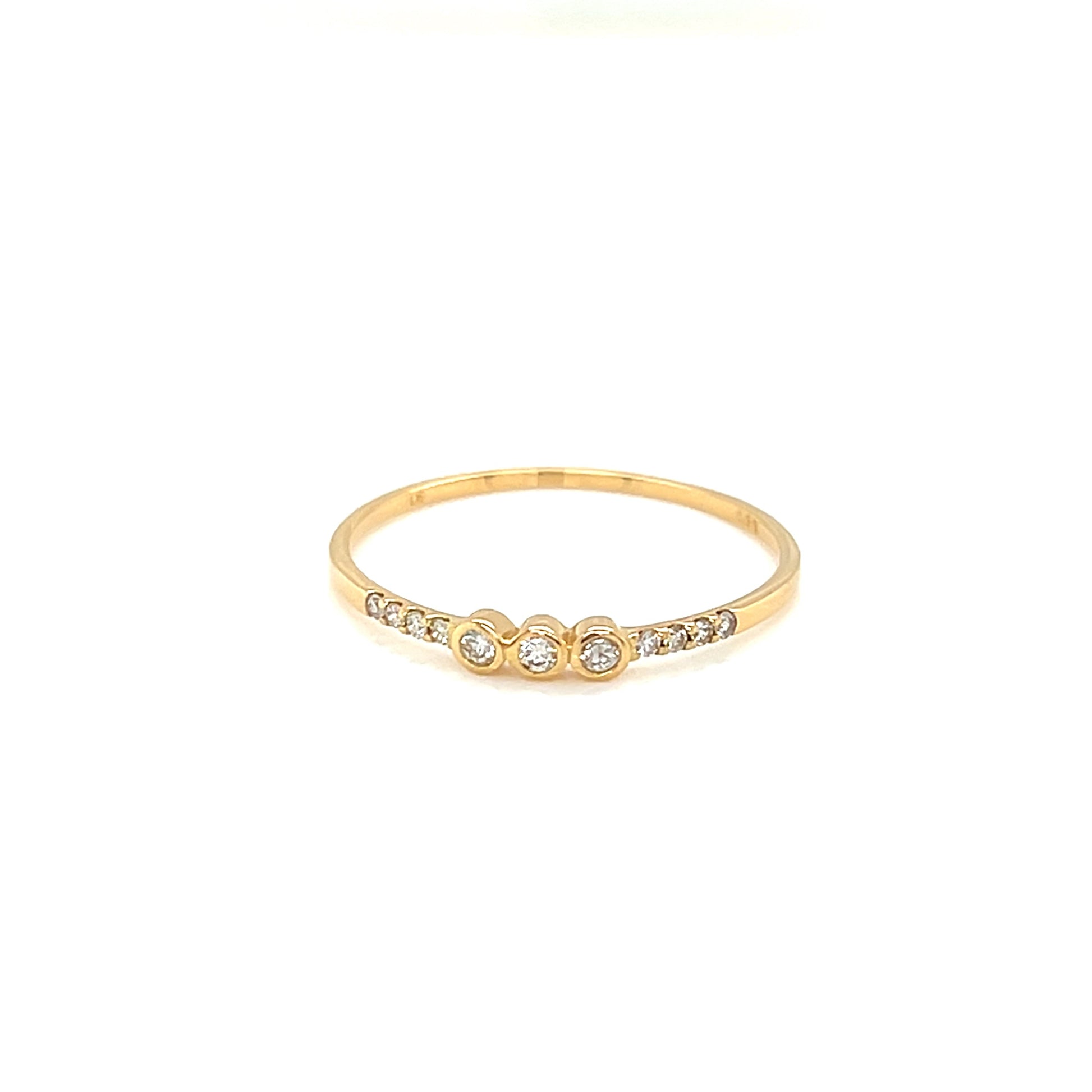 Gold ring with small diamonds on a white background