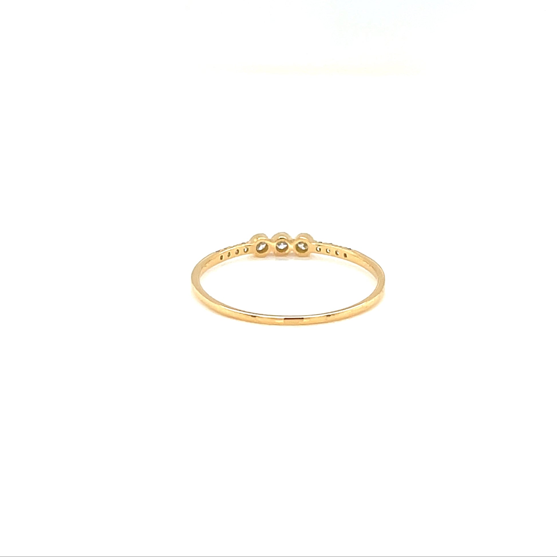 Gold ring with small stones on a white background