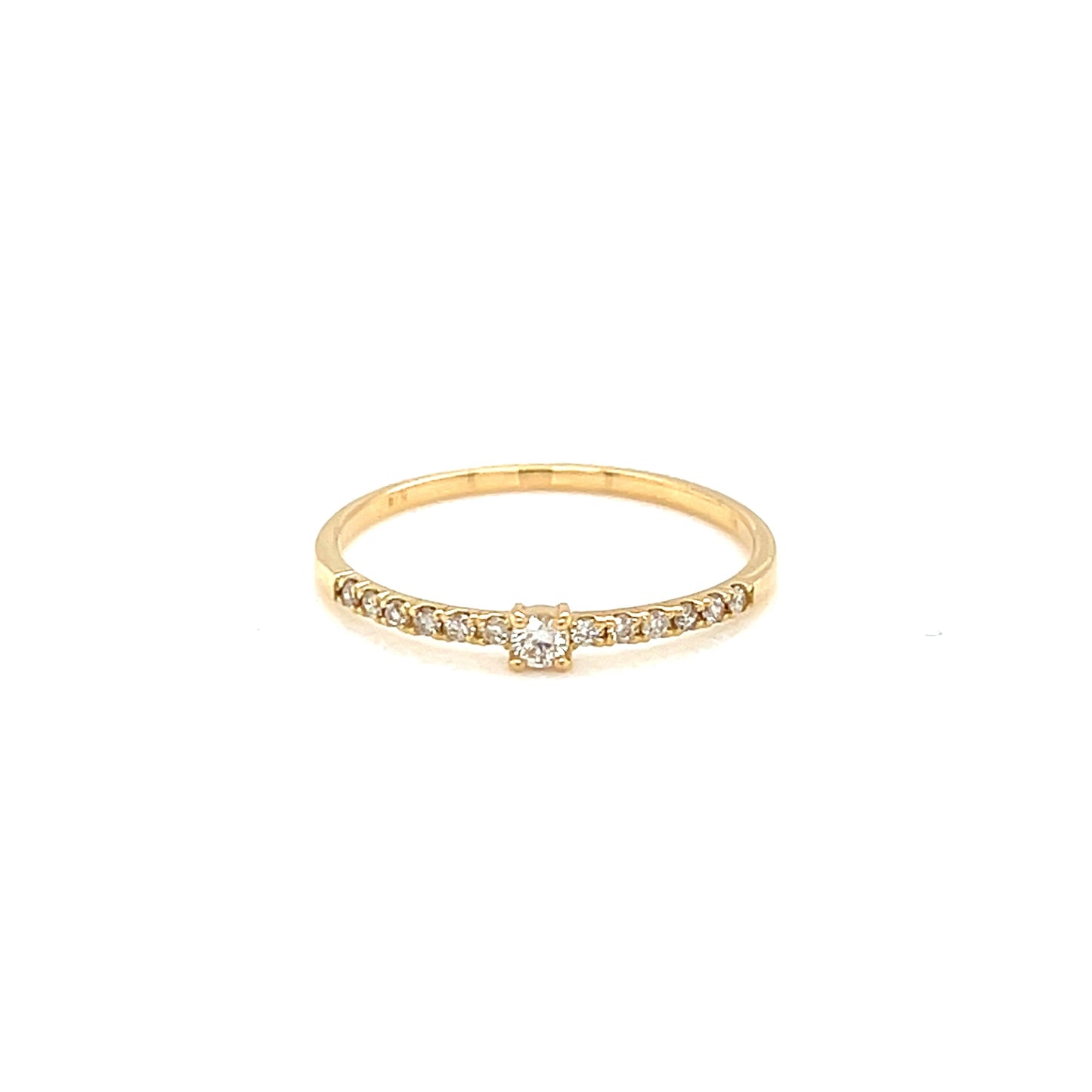 Gold ring with small diamonds on a white background