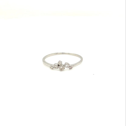 Platinum ring with small diamonds on a white background