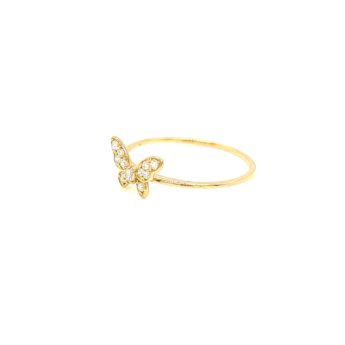 A delicate gold ring featuring a small butterfly motif paved with clear stones, set against a solid white background.