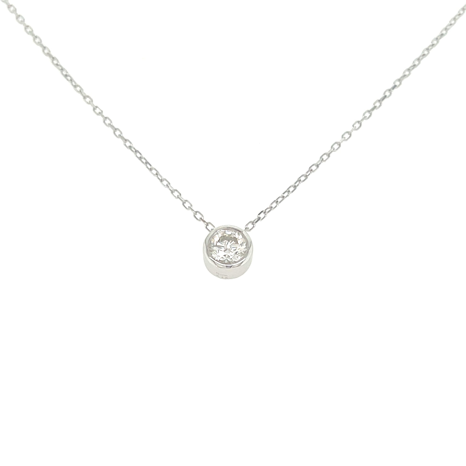 White gold necklace with a small round pendant on a white background