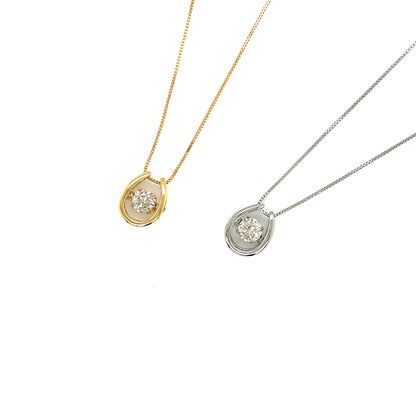 Two necklaces with horseshoe-shaped pendants on a white background