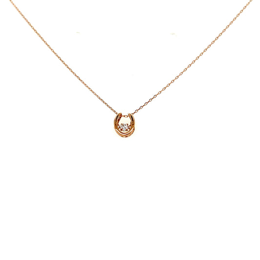Horseshoe dancing stone gold necklace on a white background