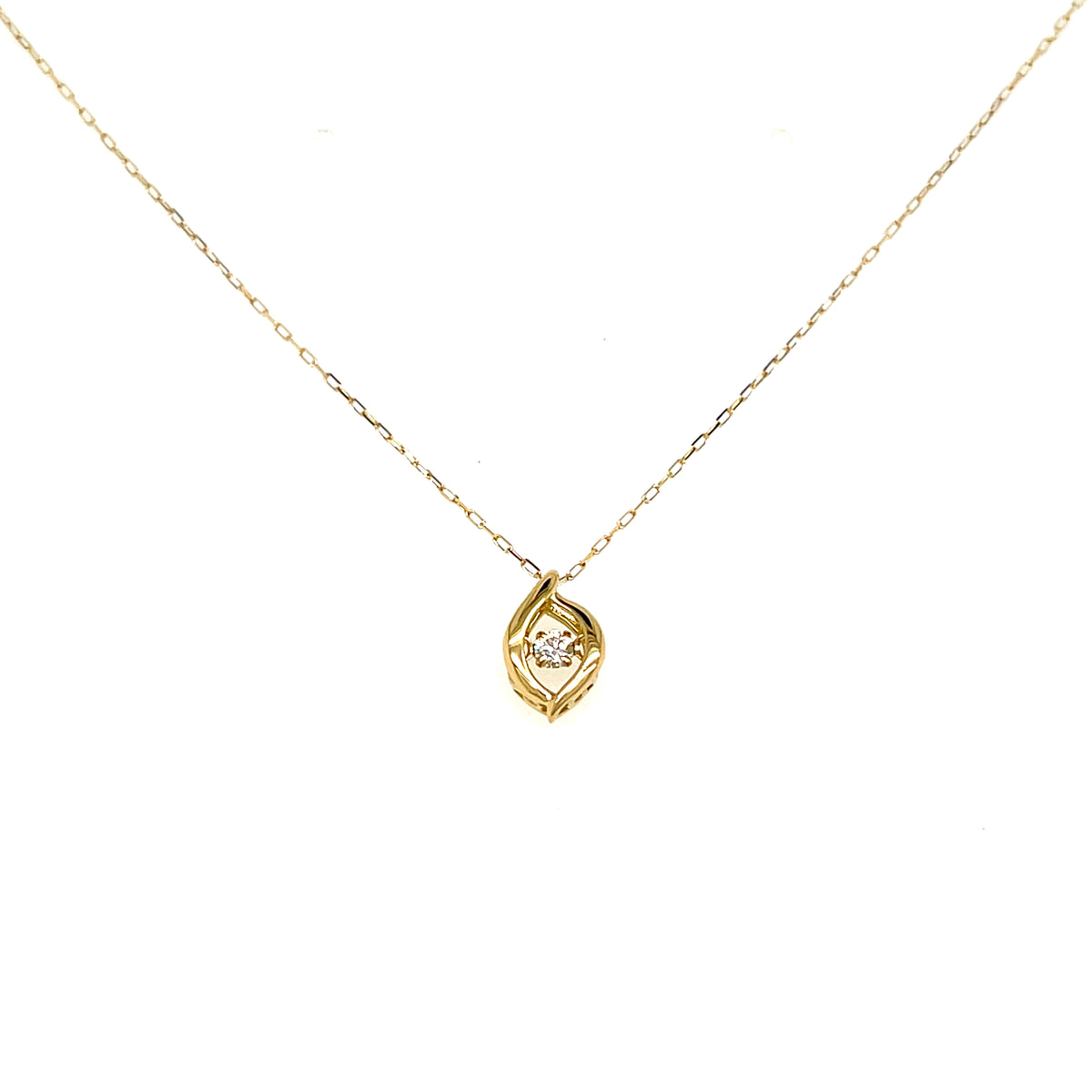 A delicate gold chain necklace with a small teardrop-shaped pendant featuring a clear central gemstone, displayed against a solid white background.