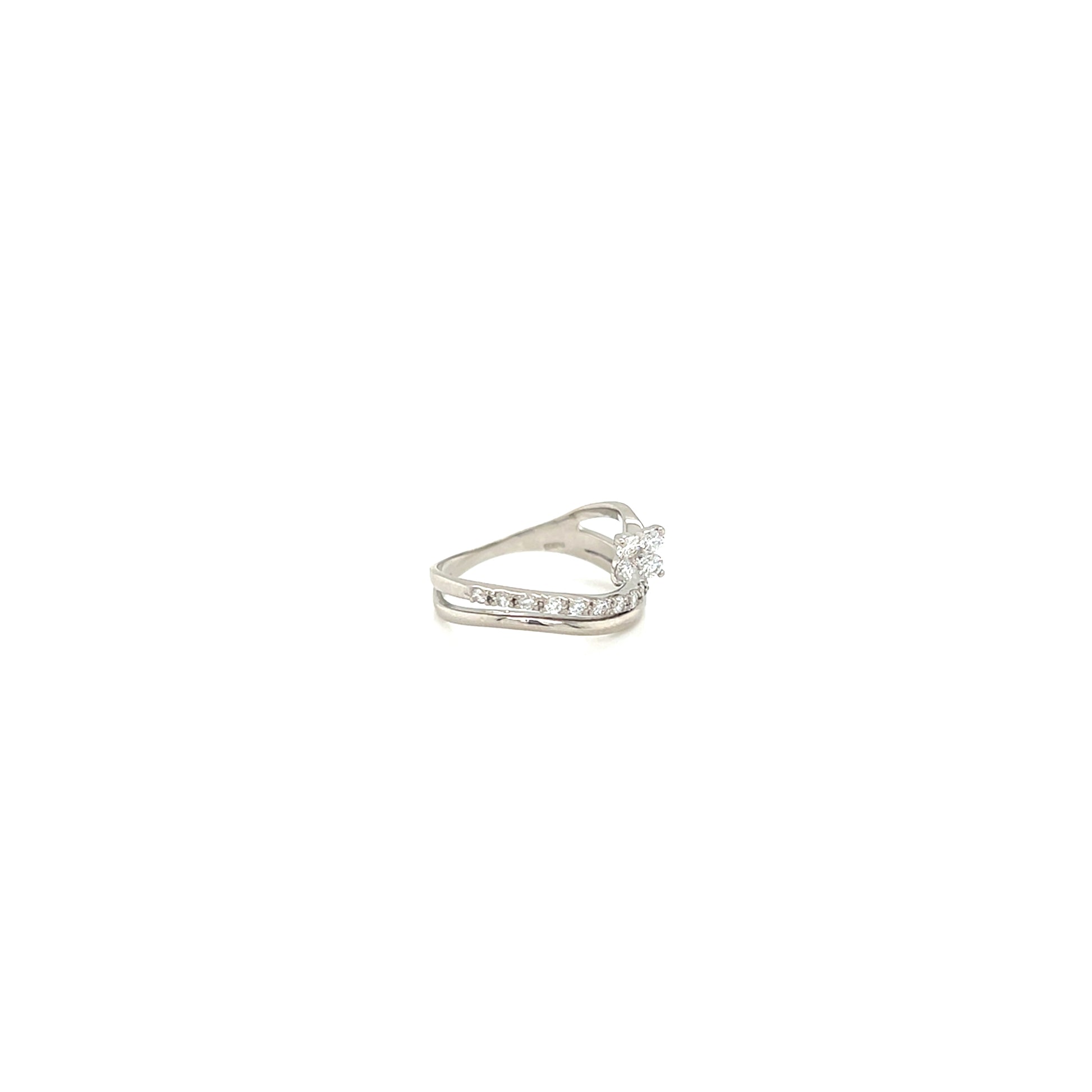 white gold ring with small diamonds on a white background