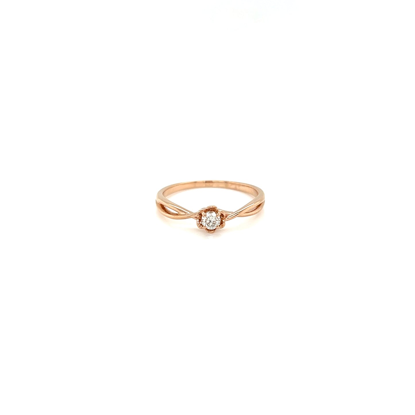 Rose gold ring with a small diamond on a white background