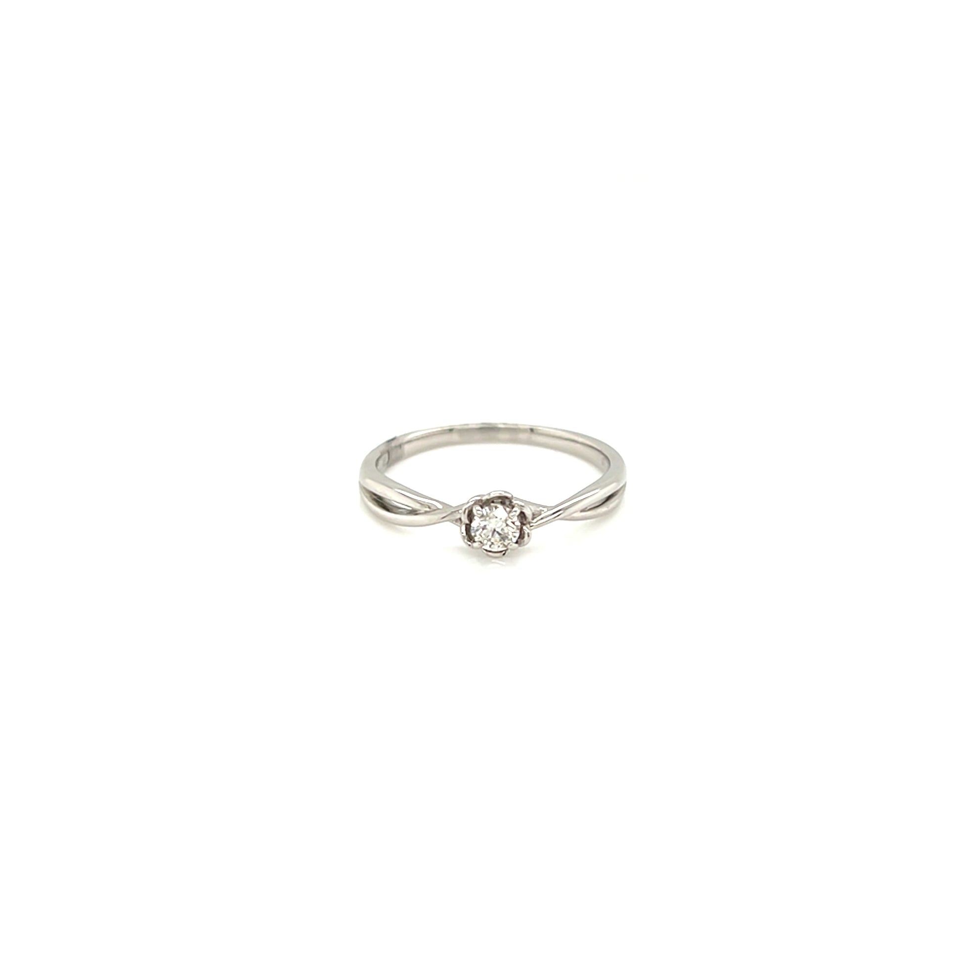 White ring with a diamond on a white background