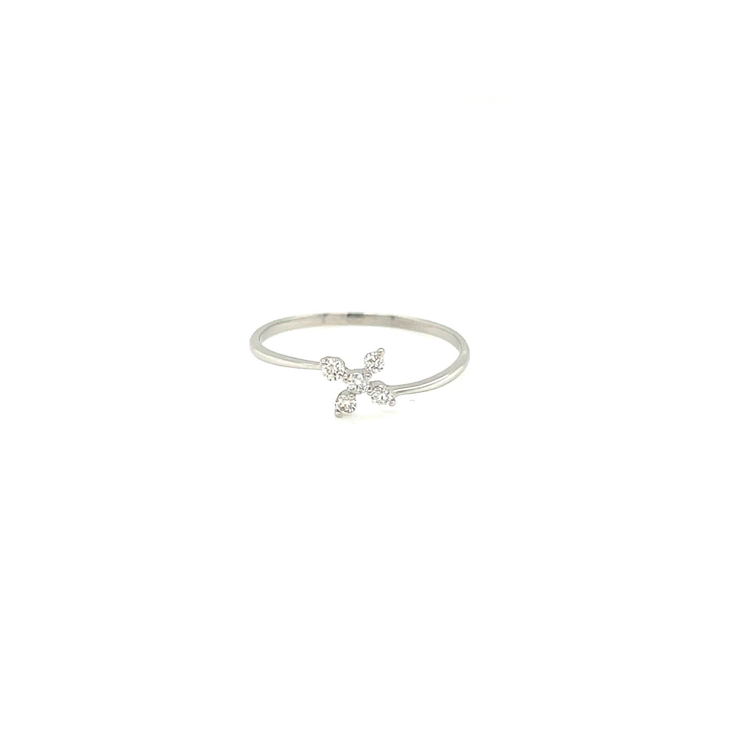 Platinum ring with a cross charm on a white background