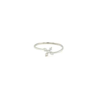 Platinum ring with a cross charm on a white background