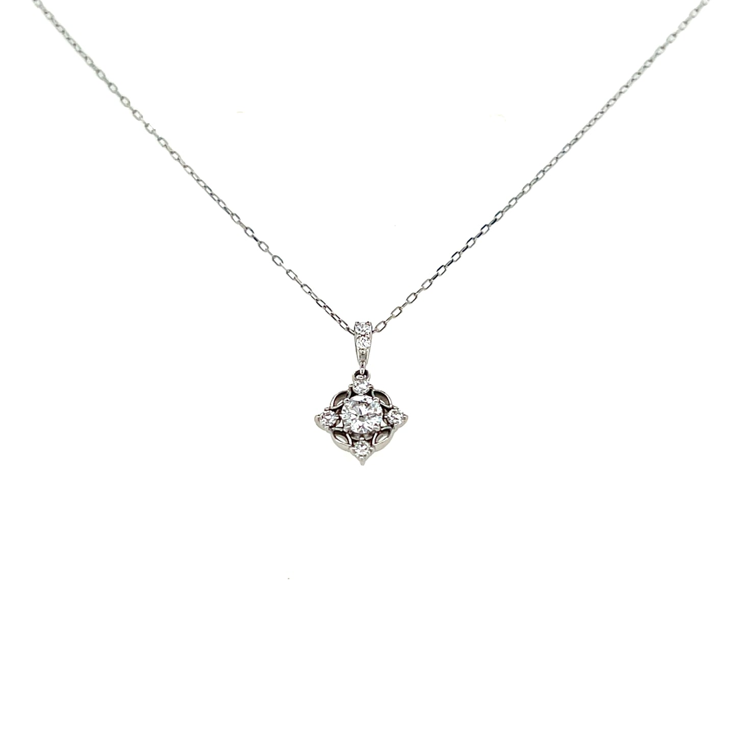 Platinum necklace with a diamond pendant on a white background