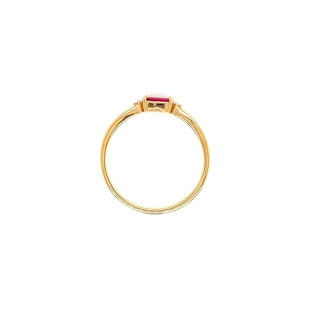 A gold ring with a small rectangular pink gemstone in a bezel setting, centered on a plain white background.