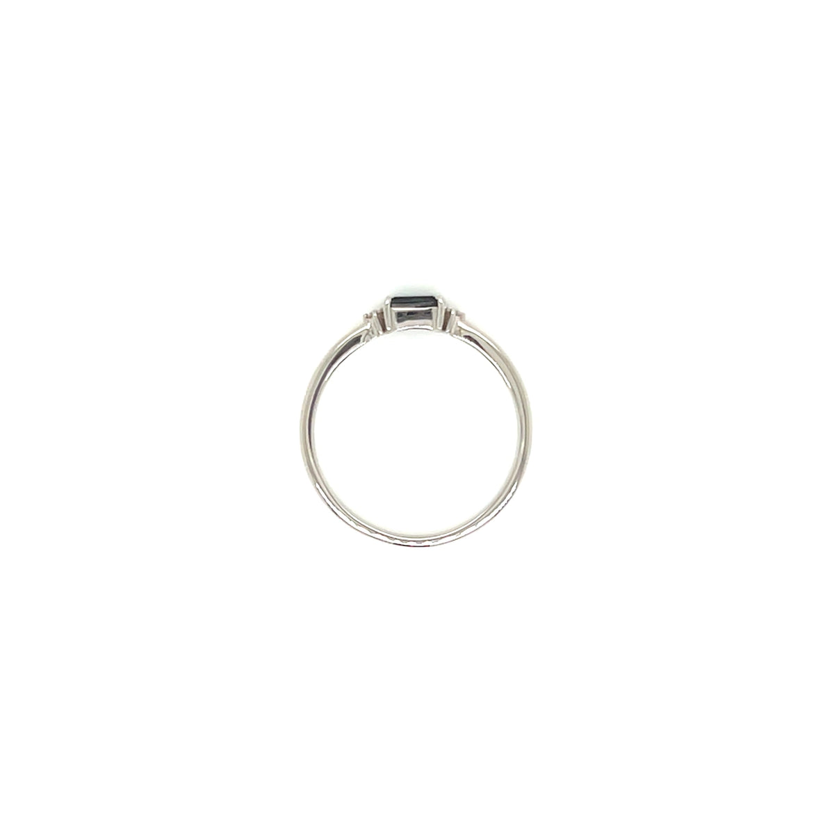 A silver ring with a small rectangular dark green gemstone, centered on a plain white background.