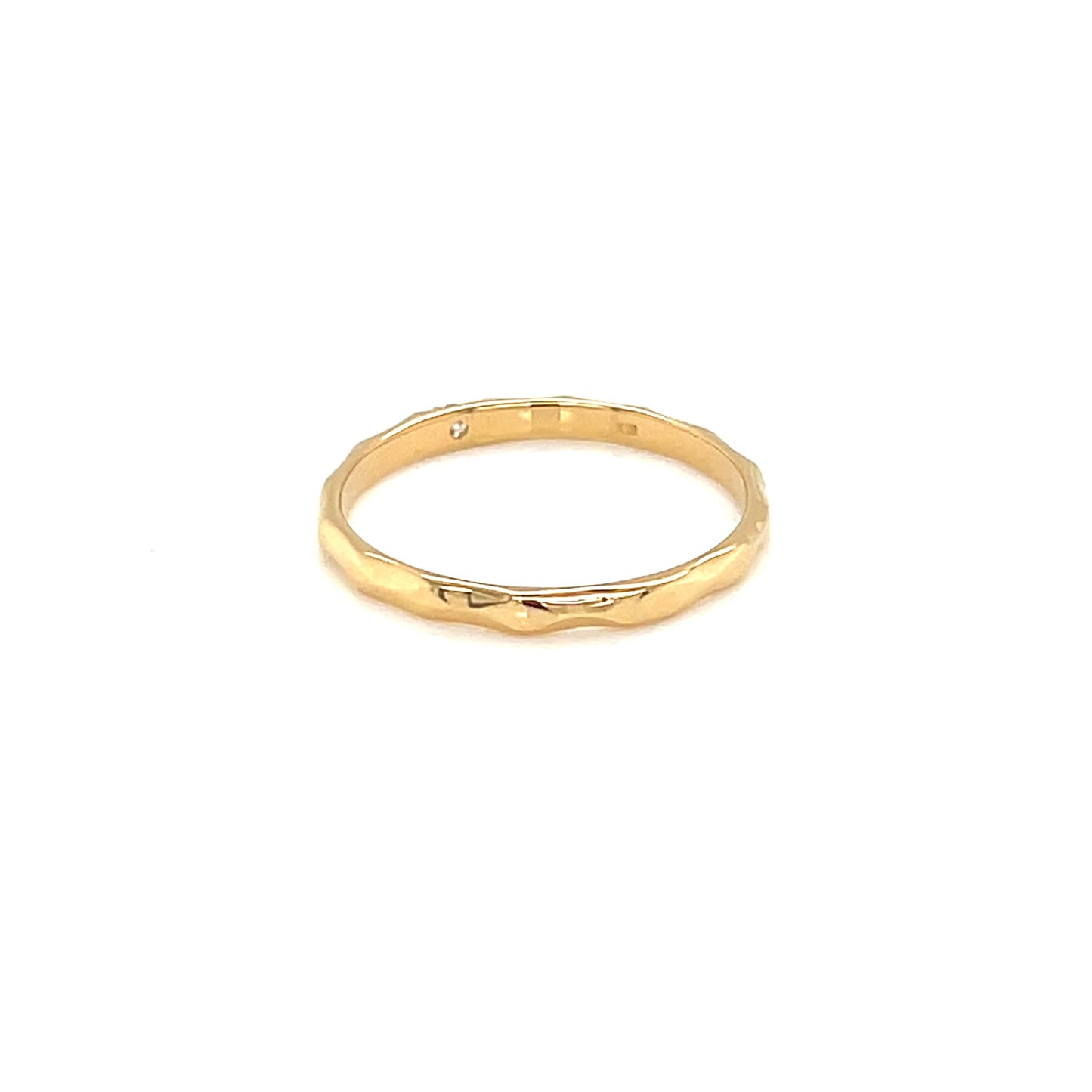 Gold ring on a white background