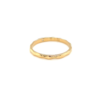 Gold ring on a white background