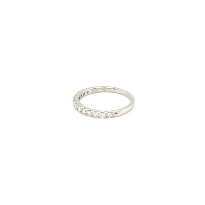 Eternity ring with small diamonds on a white background