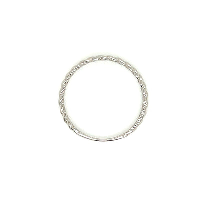 A thin silver ring with a textured, twisted rope-like band, centered on a plain white background.