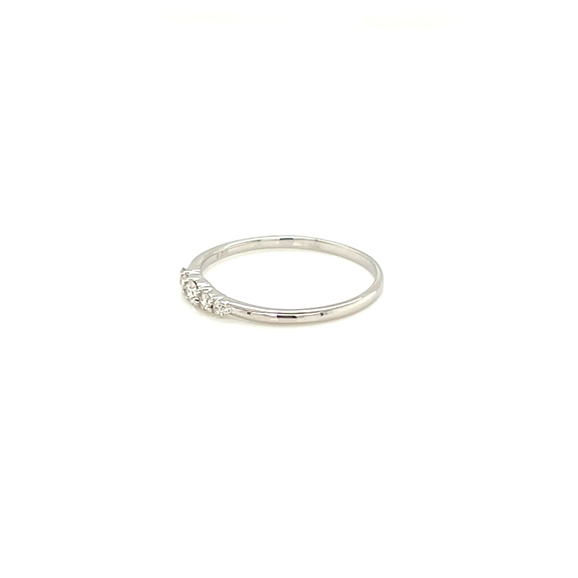 Silver ring with diamond on a white background