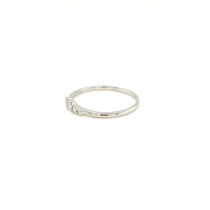 Silver ring with diamond on a white background