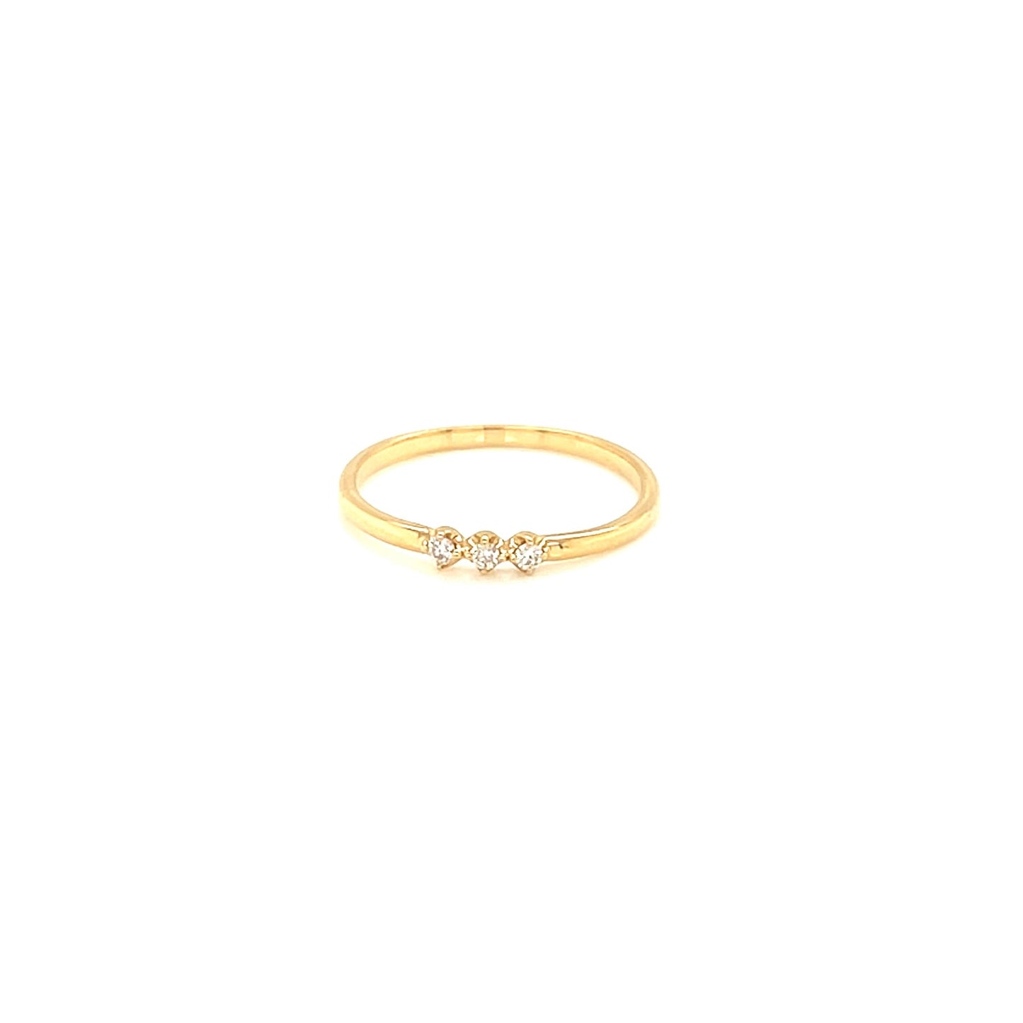 Gold ring with small diamonds on a white background