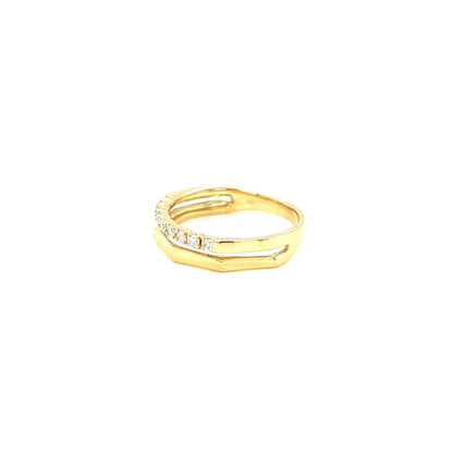 Gold ring with small diamonds on a white background