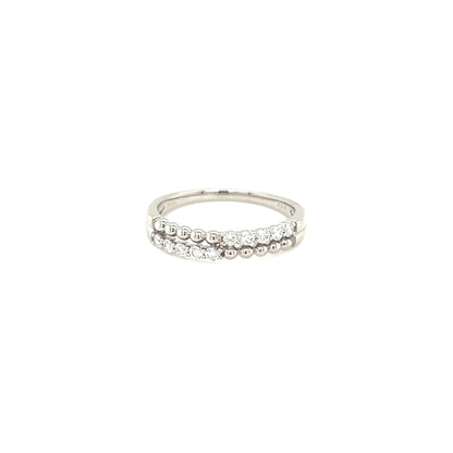 Silver ring with small stones on a white background