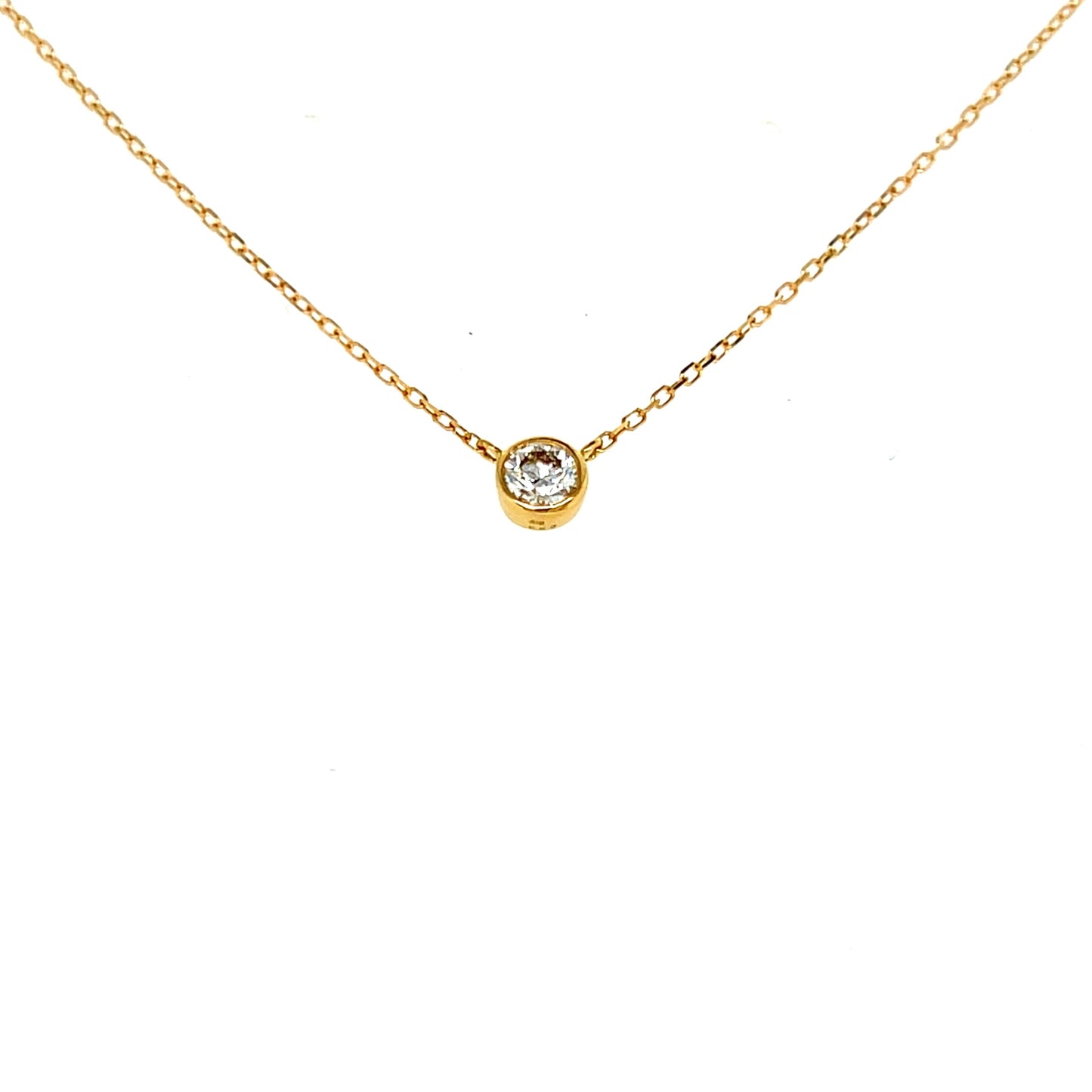 18k gold Round Gold bezel necklace on a white background