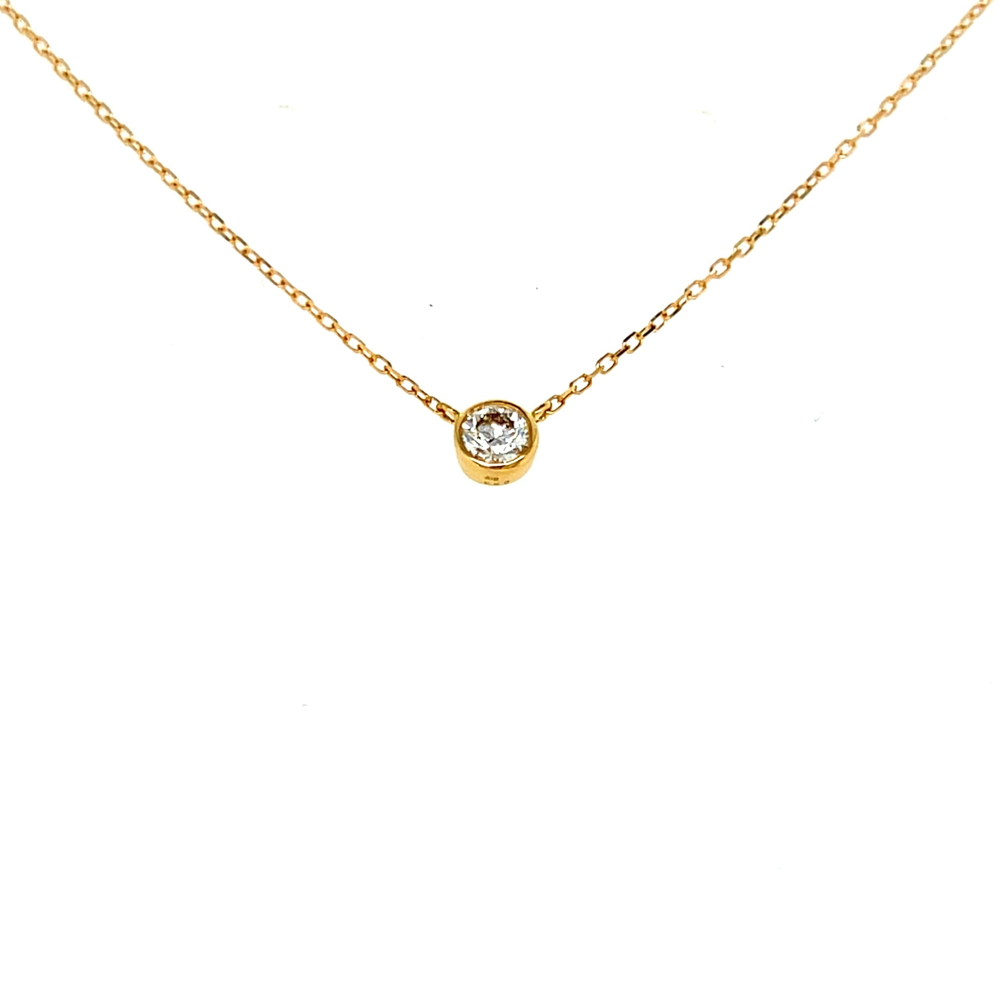 18k gold Round Gold bezel necklace on a white background