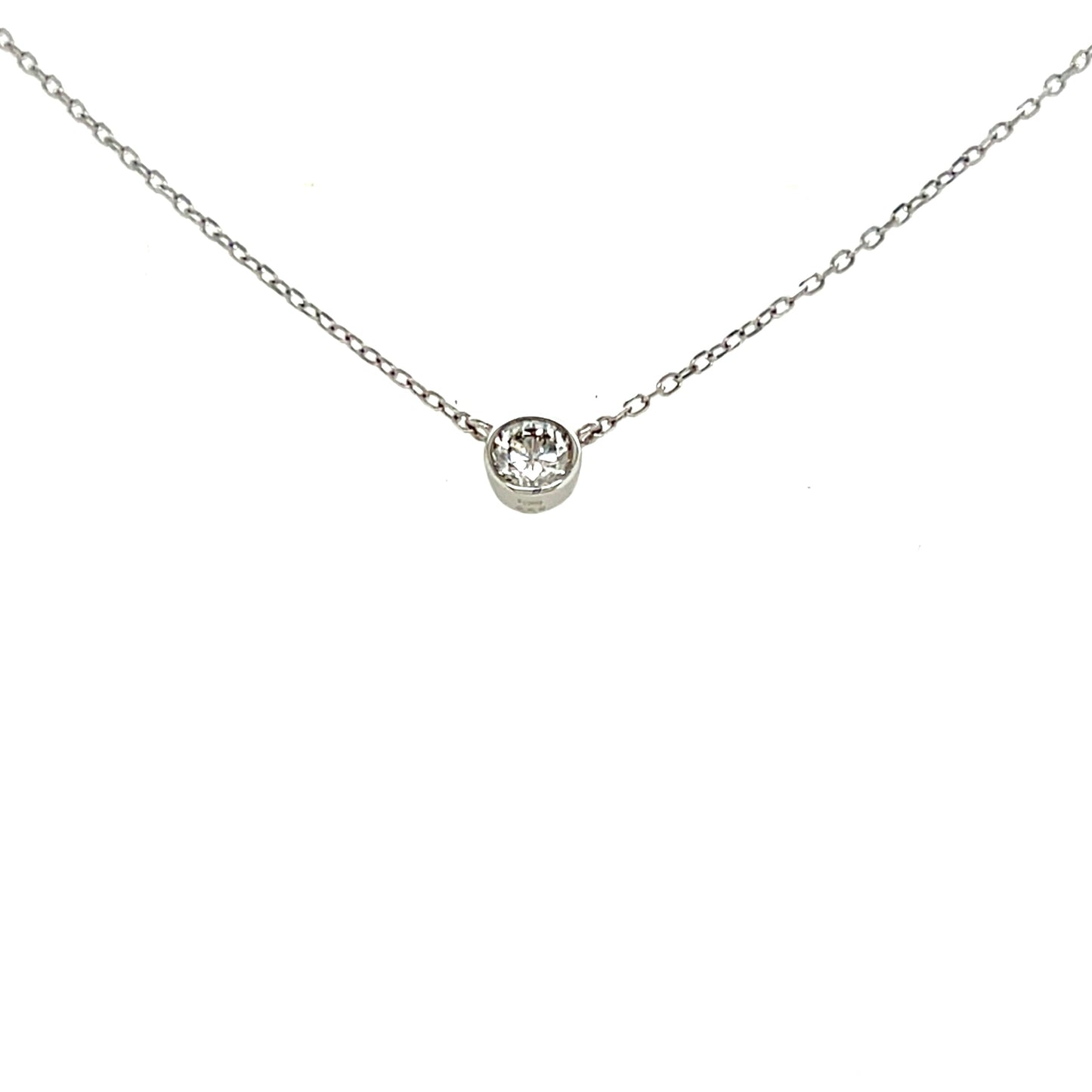 Platinum necklace with a round pendant on a white background