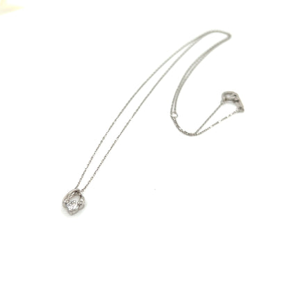 Platinum white gold necklace with a pendant on a white background