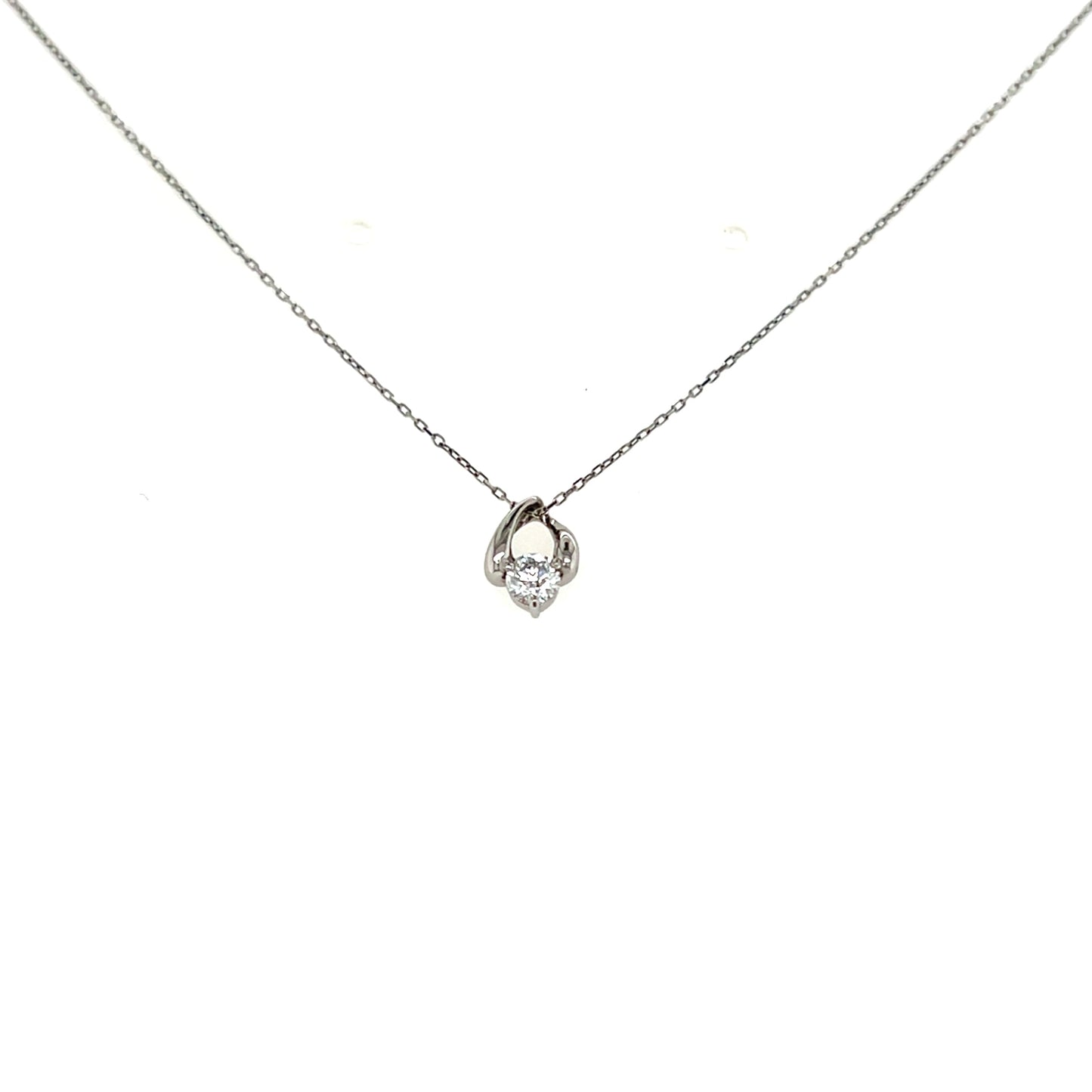 platinum necklace with a waterdrop shaped pendant on a white background