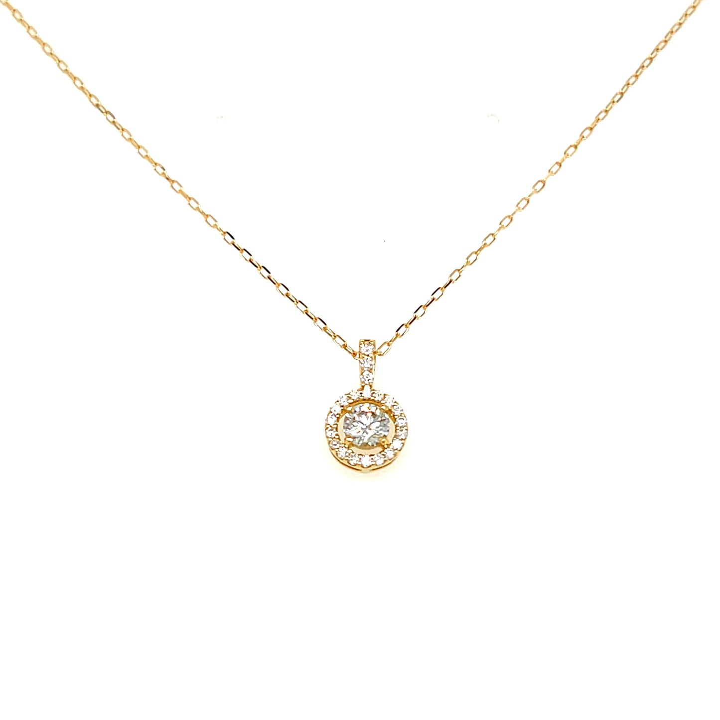 A delicate yellow gold chain necklace with a small circular pendant featuring a clear central gemstone surrounded by a halo of small diamonds, set against a plain white background.