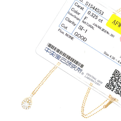 A close-up of a gold chain necklace with a teardrop-shaped clear gemstone pendant, shown alongside a detailed certification card from a gemstone laboratory.