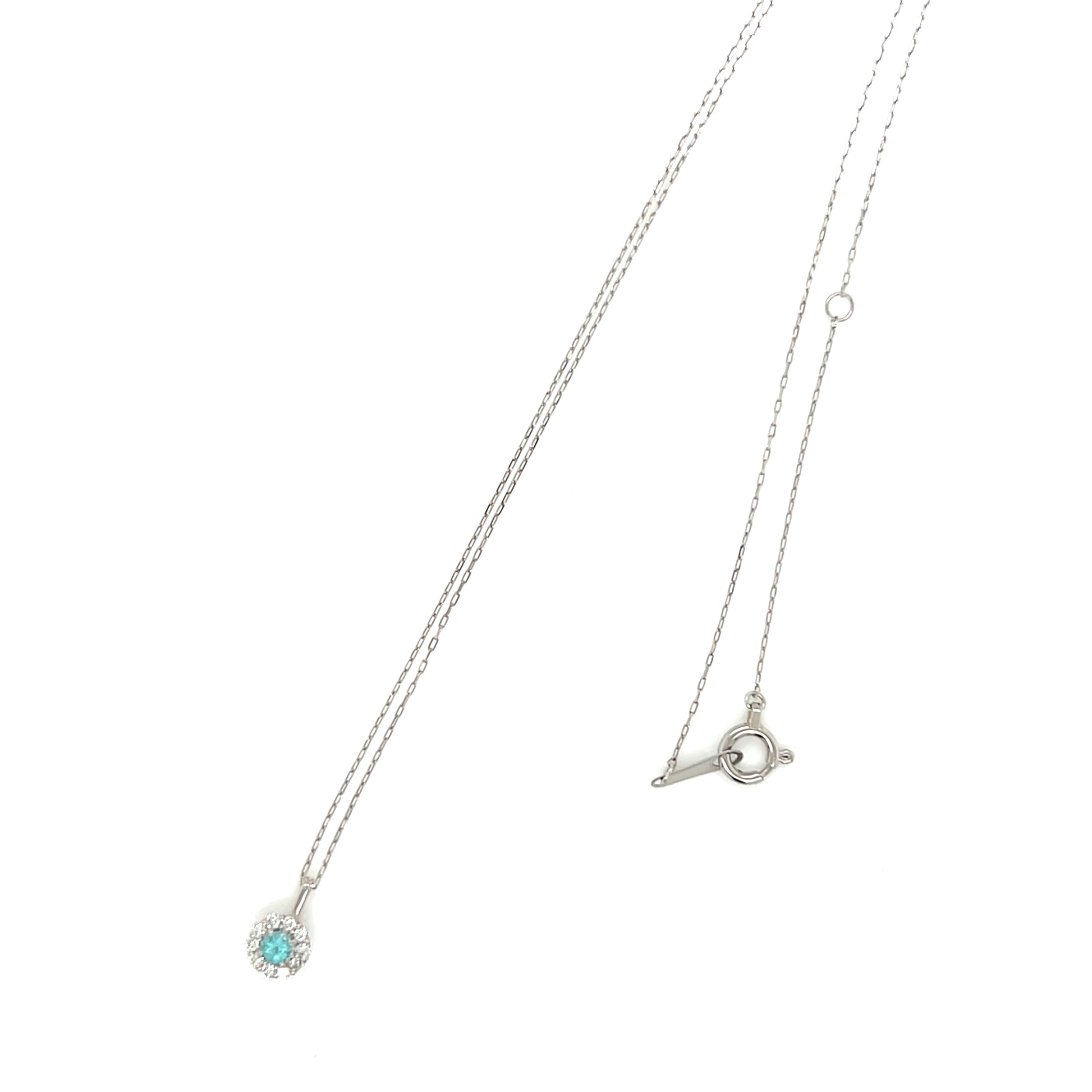 Necklace with a pendant featuring a Paraiba tourmaline gemstone on a white background