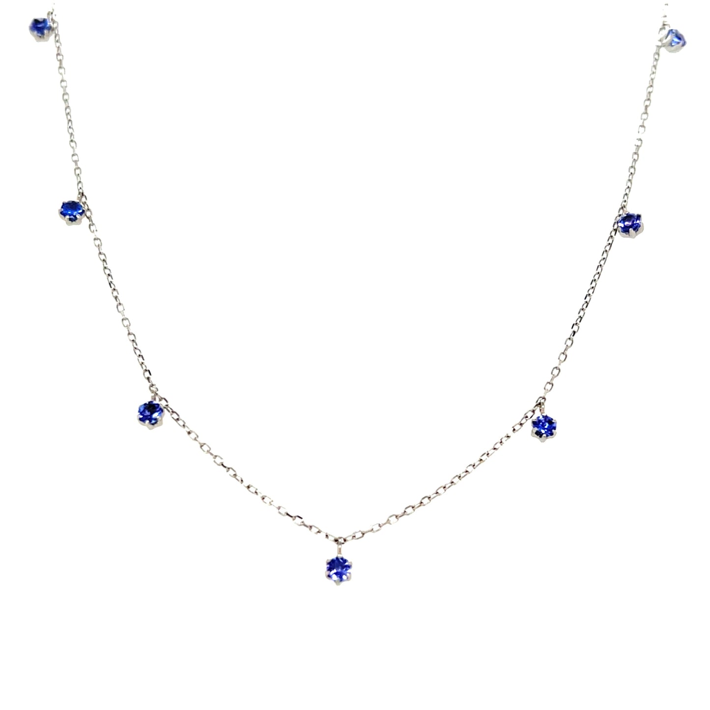 Tanzanite station necklace on a white background