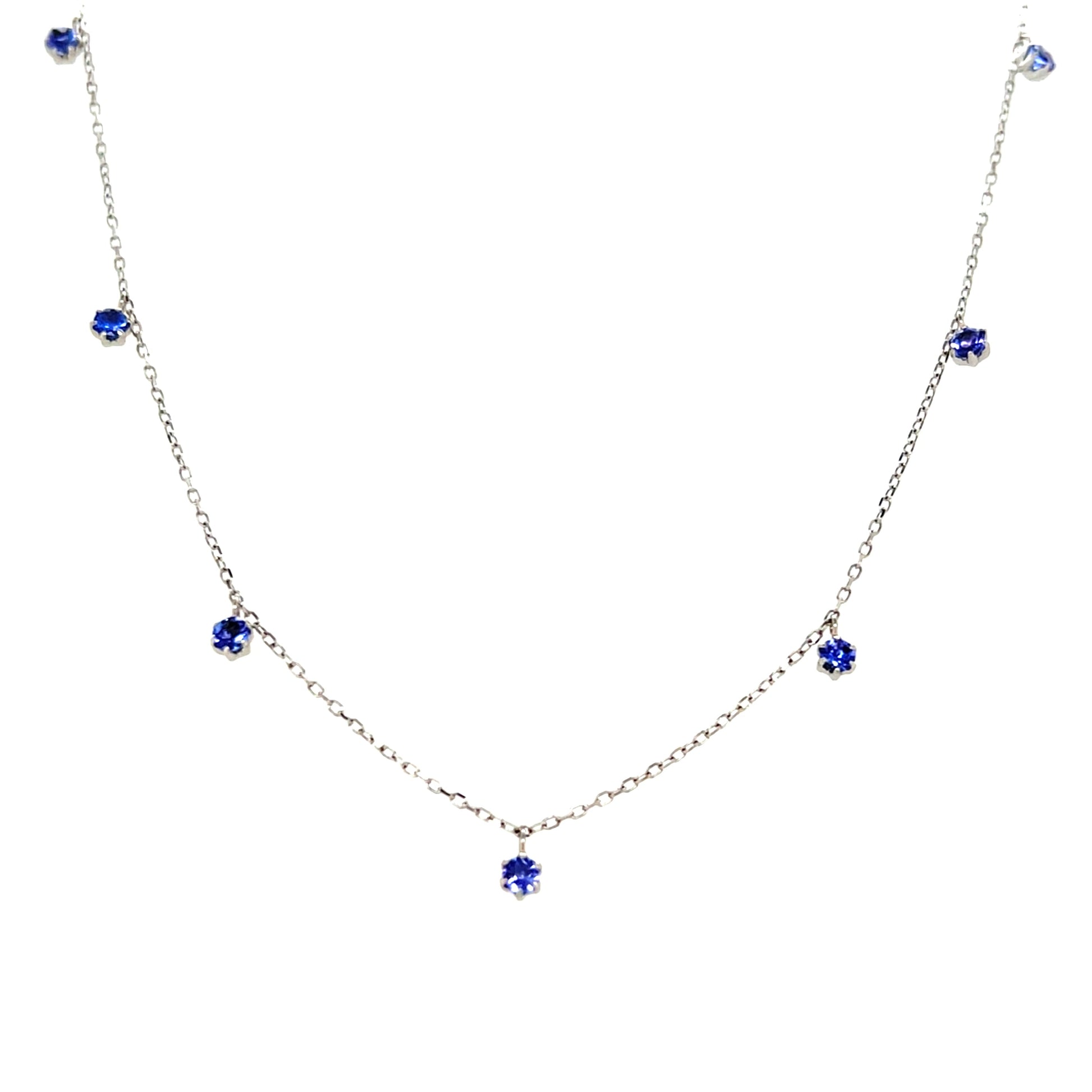 Tanzanite station necklace on a white background